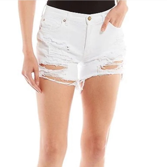 Free People
Maggie Mid Rise Frayed Hem Distressed Denim Shorts. - Picture 3 of 13
